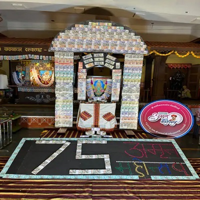 Lord Shree Swami Narayan ji's wonderful decoration done with 75 lakh rupees notes recorded in the Golden Book of World Records